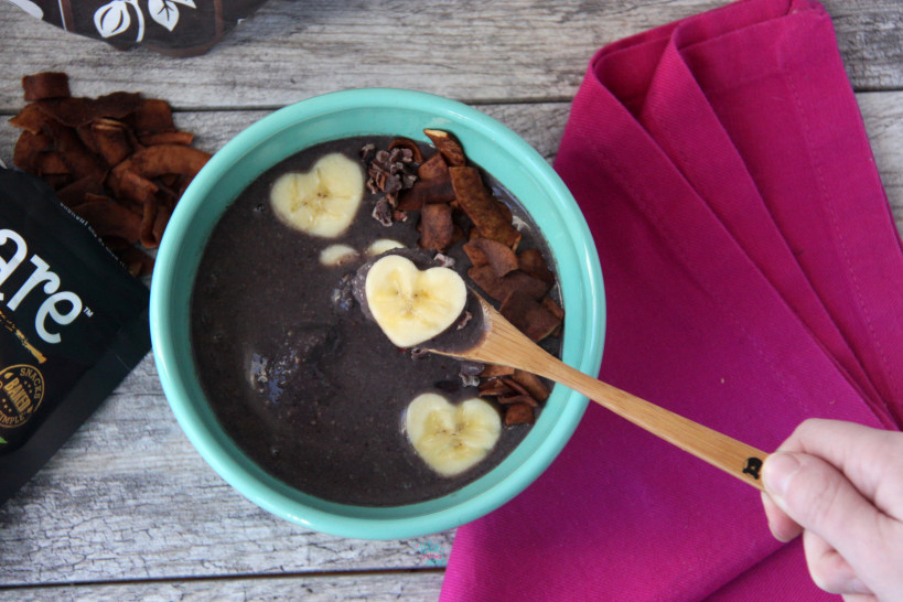 Acai Protein Smoothie Bowl with chocolate coconut chips, cacao nibs, and bananas. (vegan and gluten free)