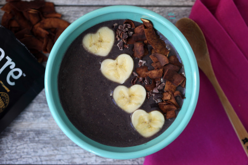 Acai Protein Smoothie Bowl with chocolate coconut chips, cacao nibs, and bananas. (vegan and gluten free)