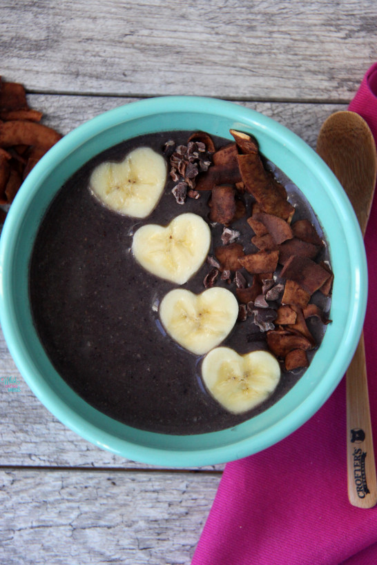 Acai Protein Smoothie Bowl with chocolate coconut chips, cacao nibs, and bananas. (vegan and gluten free)