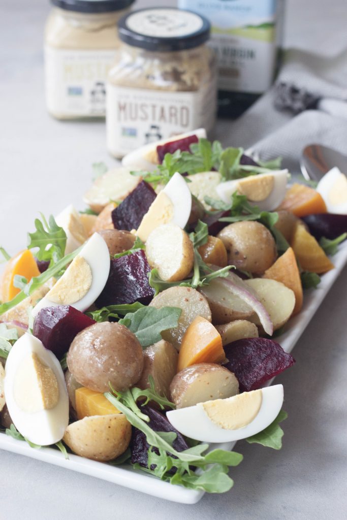 Roasted Beet Potato Salad isn't your granny's potato salad, this colorful salad has spunk, added nutrition, and it's own beet. A Whisk and Two Wands