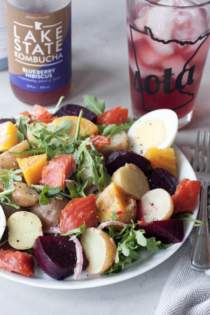 Roasted Beet Potato Salad isn't your granny's potato salad, this colorful salad has spunk, added nutrition, and it's own beet. A Whisk and Two Wands