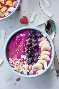 Mango Dragon Probiotic Smoothie Bowl, A Whisk and Two Wands