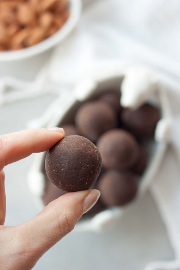 Peppermint Brownie Protein Truffles are decadent easy to make brownie truffles with a hint of mint that are healthy and packed with superfoods and protein! No bake, gluten free, dairy free, vegan, plant-based, paleo.