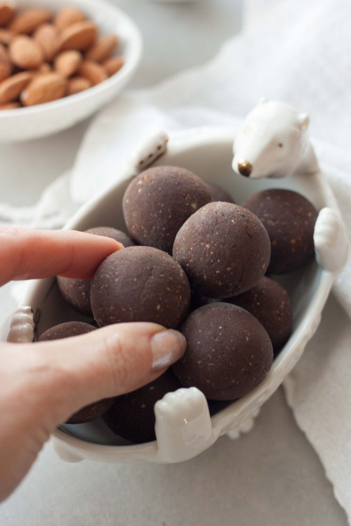 Peppermint Brownie Protein Truffles are decadent easy to make brownie truffles with a hint of mint that are healthy and packed with superfoods and protein! No bake, gluten free, dairy free, vegan, plant-based, paleo.