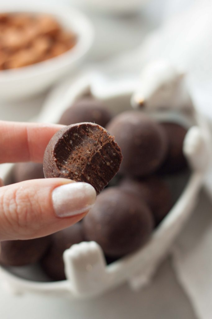 Peppermint Brownie Protein Truffles are decadent easy to make brownie truffles with a hint of mint that are healthy and packed with superfoods and protein! No bake, gluten free, dairy free, vegan, plant-based, paleo.