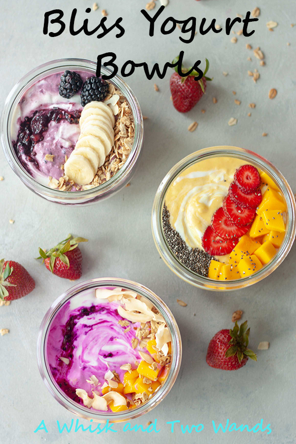 3 yogurt bowls, mango, strawberries, blackberries, pitaya, mango, granola, bananas, chia