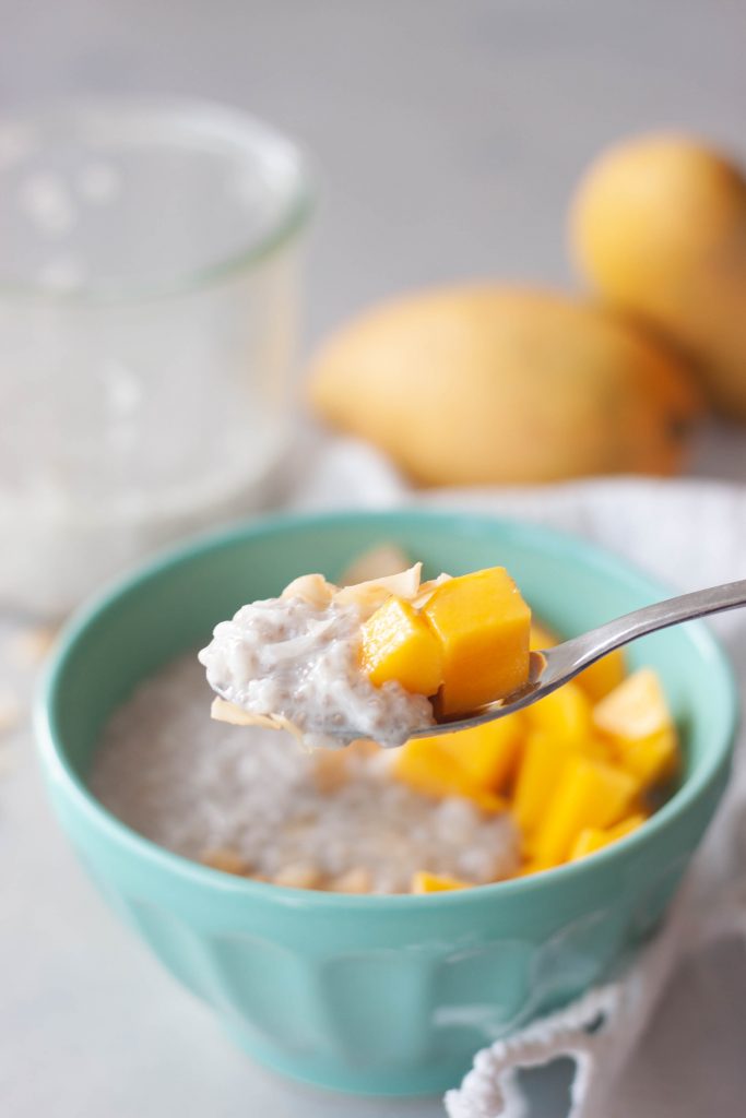 Spoon of Mango Coconut Chia Rice Pudding