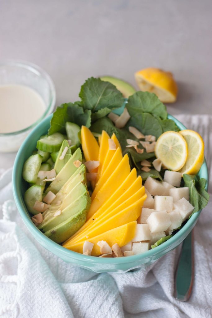 Tropical Mango Avocado Kale Salad in bowl