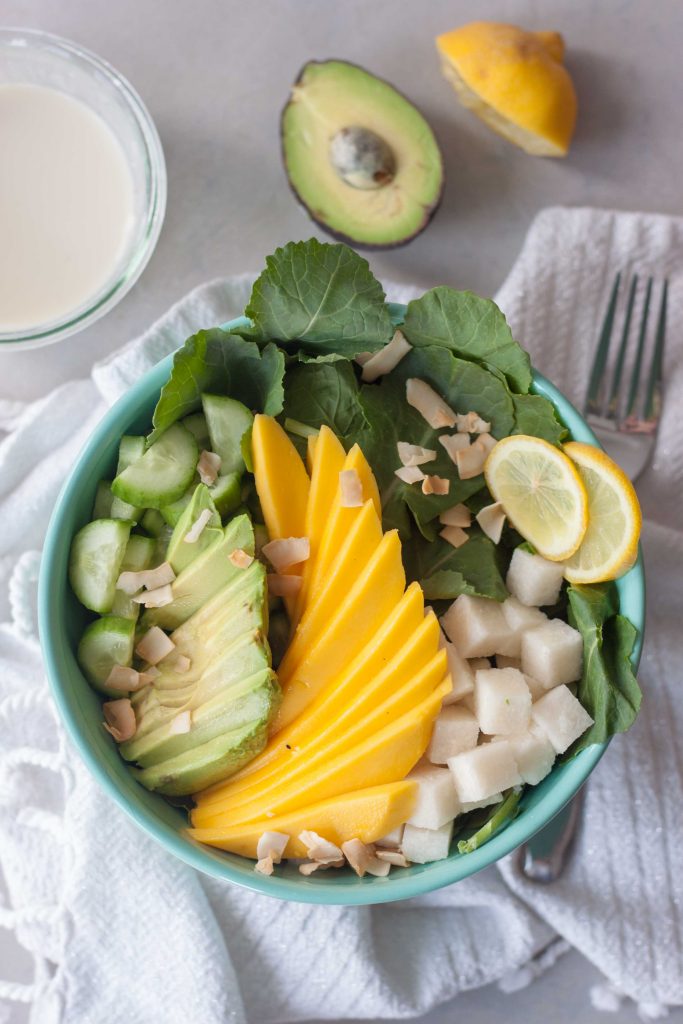 Tropical Mango Avocado Kale Salad in bowl