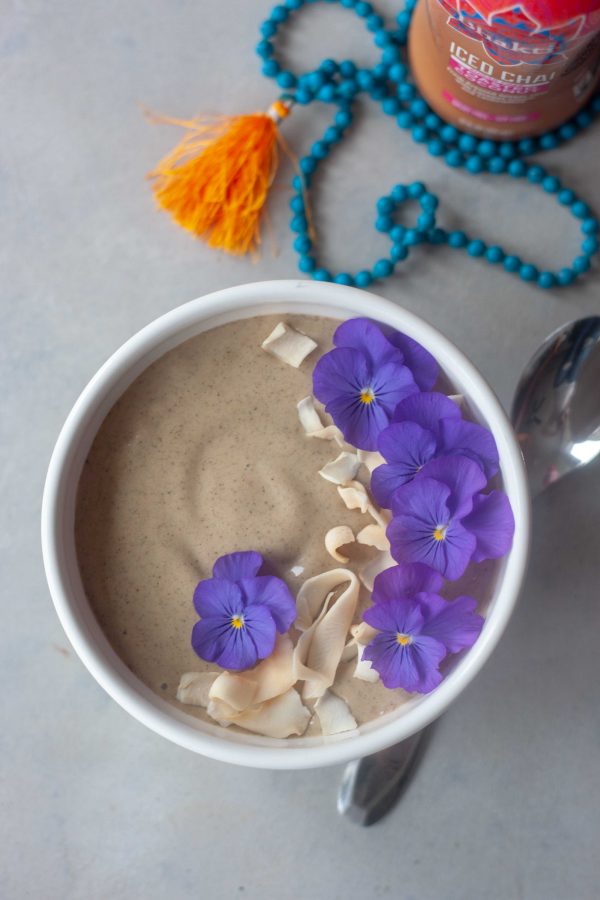 Sweet Chai Of Mine Smoothie Bowl with edible flowers and coconut