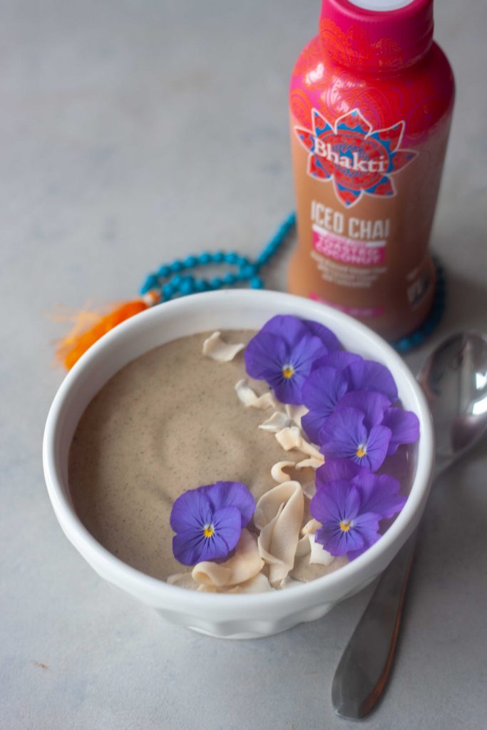 Sweet Chai Of Mine Smoothie Bowl with edible flowers and coconut