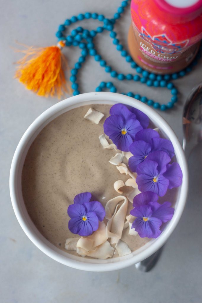 Sweet Chai Of Mine Smoothie Bowl with edible flowers and coconut