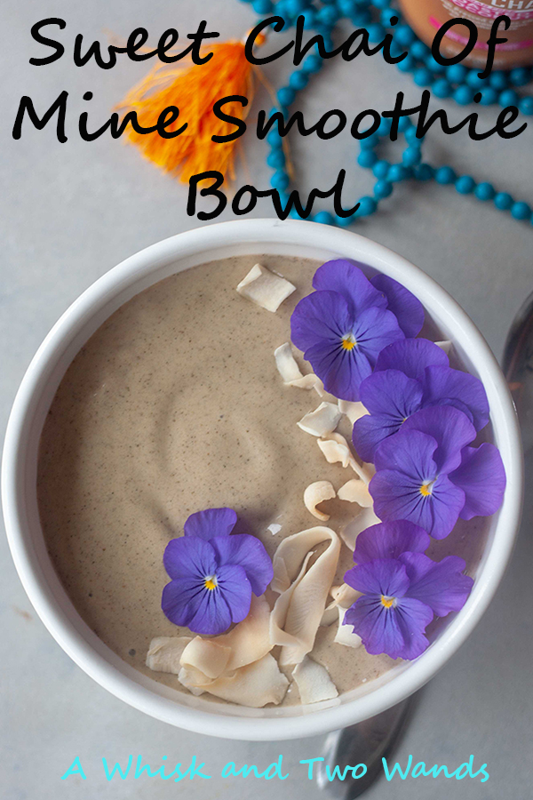 Sweet Chai Of Mine Smoothie Bowl with edible flowers and coconut