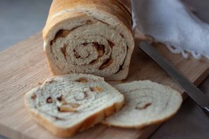 inside of Apple Cinnamon Swirl Sourdough Bread and slices