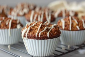 Carrot Cake Oatmeal Muffins drizzled with Cashew Cream