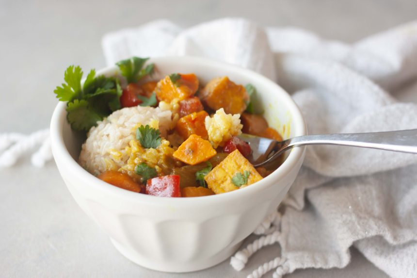 Bowl with fork of Sweet Potato Yellow Curry