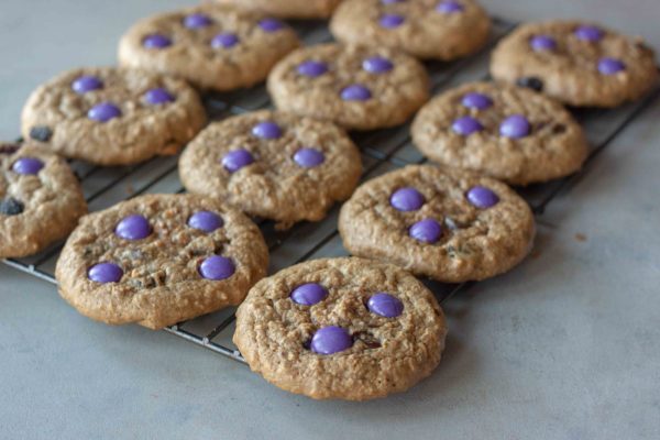 Cooling rack with Milk Monster Cookies.