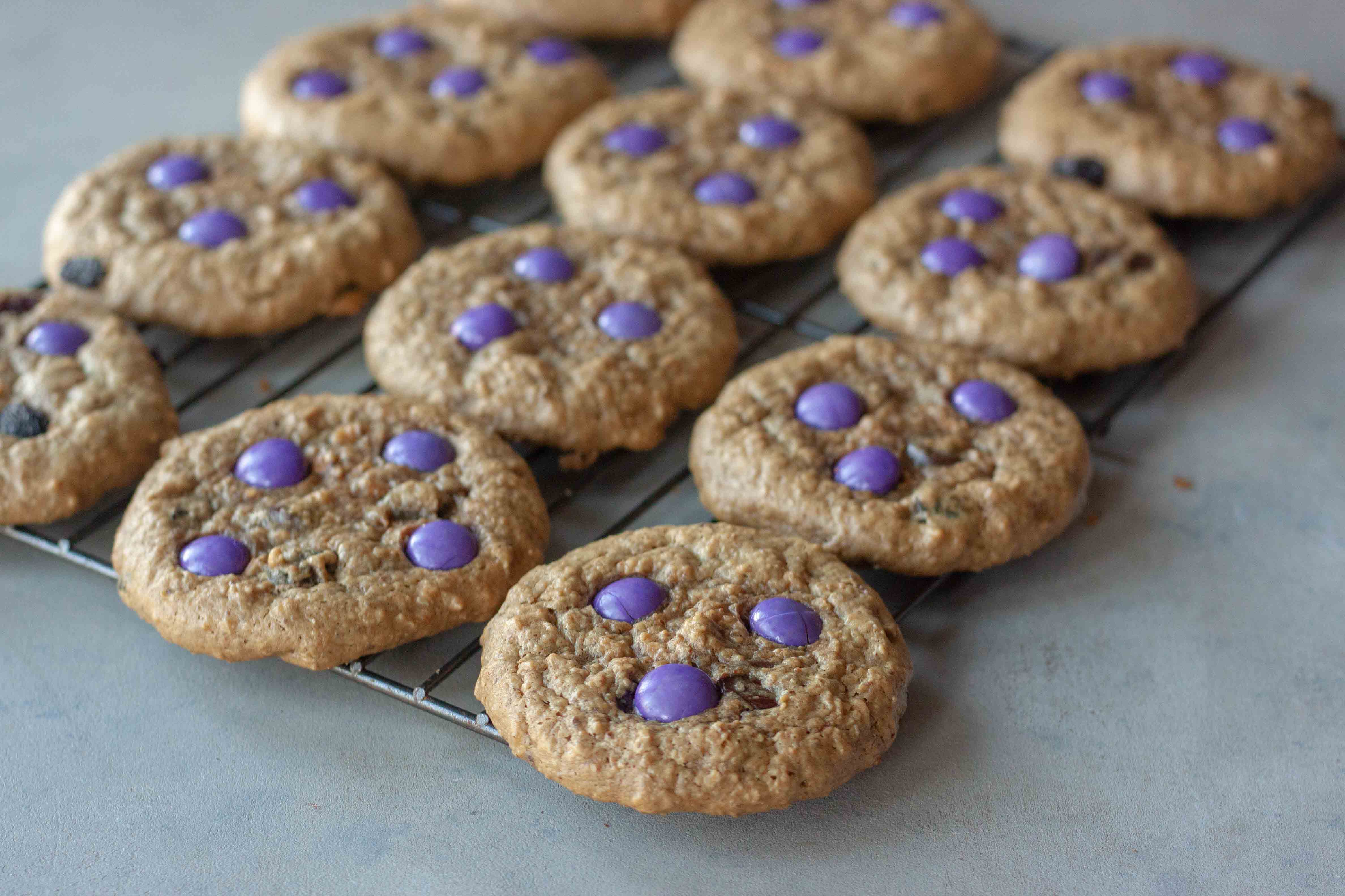 Cooling rack with Milk Monster Cookies.