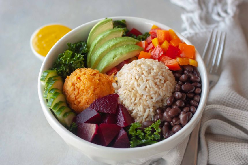 Mama's Macro Bowl with Turmeric Tahini Drizzle on the side