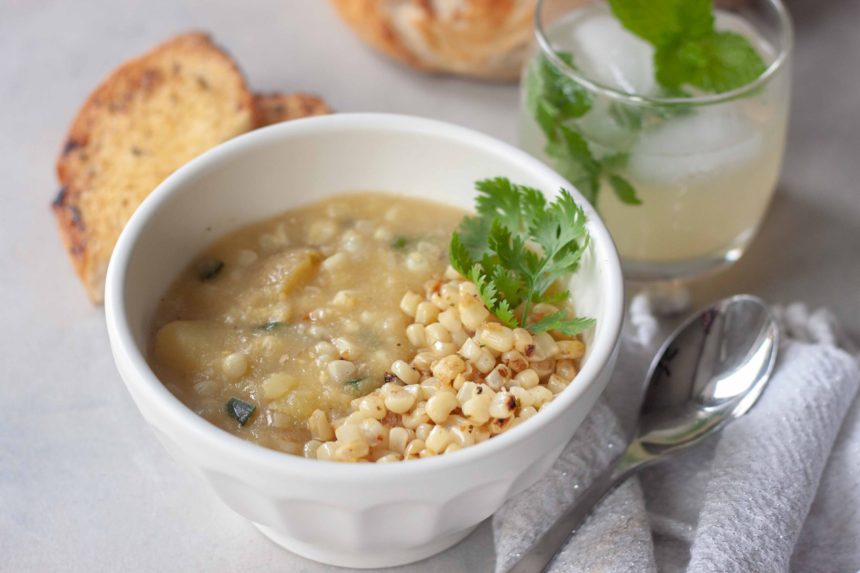 Bowl of Spicy Sweet Corn Soup with Sautéed Chili Lime Corn