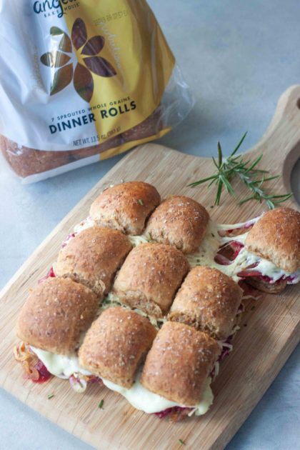 Pulling a Cranberry Grilled Cheese Sliders with melty cheese