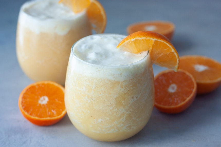 Orange Creamsicle Smoothies in glasses with oranges