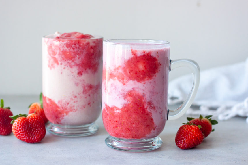 Two Double Strawberry Shakes with strawberries