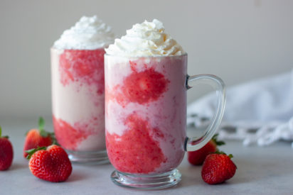 Two Double Strawberry Shakes with strawberries