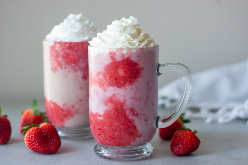 Two Double Strawberry Shakes with strawberries