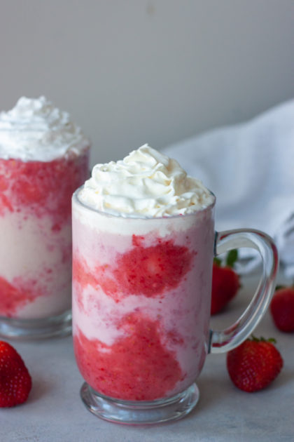 Two Double Strawberry Shakes with strawberries