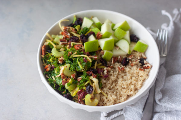 Bowl with Crunchy Cran-Apple Quinoa Salad and fork.