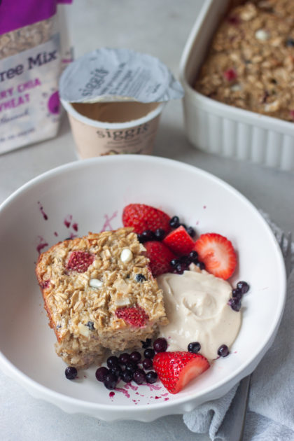 Bowl with Red White Blueberry Muesli Baked Oatmeal with Vanilla Cinnamon Plantbased Yogurt and more berries!