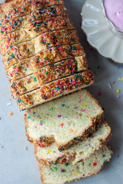 Sliced Sprinkle Scone Loaf and pink latte