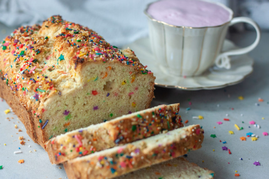 Sliced Sprinkle Scone Loaf and pink latte