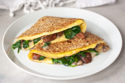 Oma-dilla with mushrooms, baby spinach, and cheese