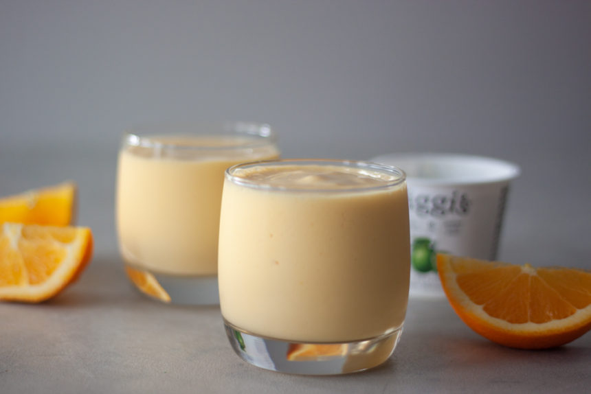 Mango Orange Key Lime Smoothies, orange wedges, yogurt container